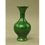 A Chinese green porcelain vase. 17 cm high.