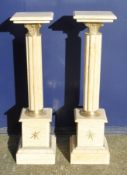 A pair of beige marble columns. 100 cm high.