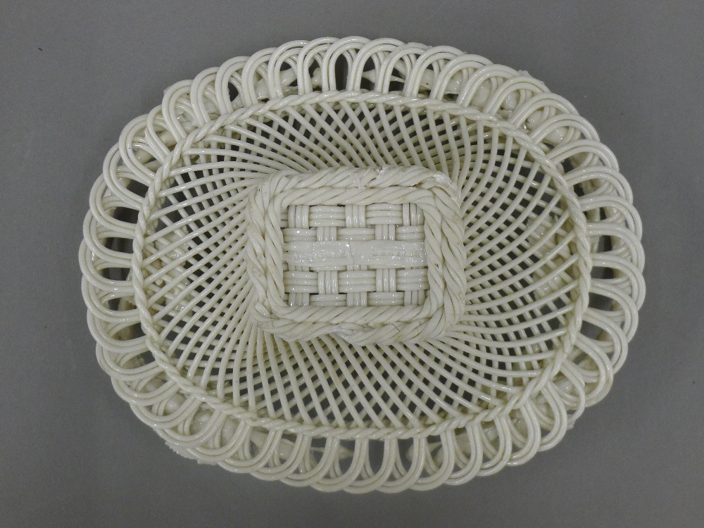 A Belleek porcelain basket. 20.5 cm long. - Image 5 of 6