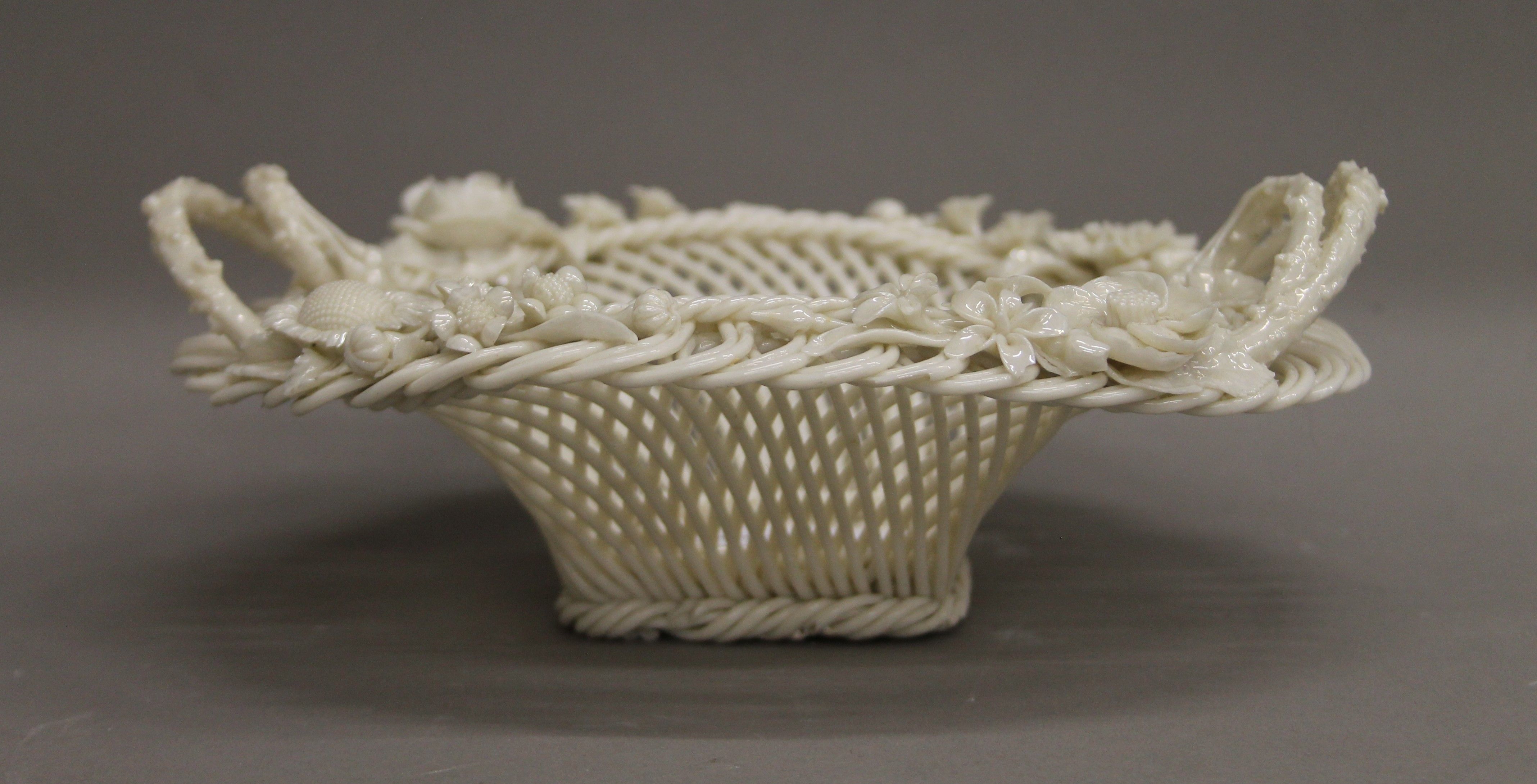 A Belleek porcelain basket. 20.5 cm long. - Image 2 of 6