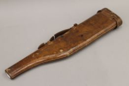 A large unusual Victorian leather leg of mutton gun case. 121 cm long.