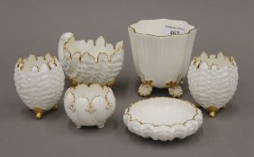 Six Coalport gilt edged porcelain vases. The largest 9 cm high.