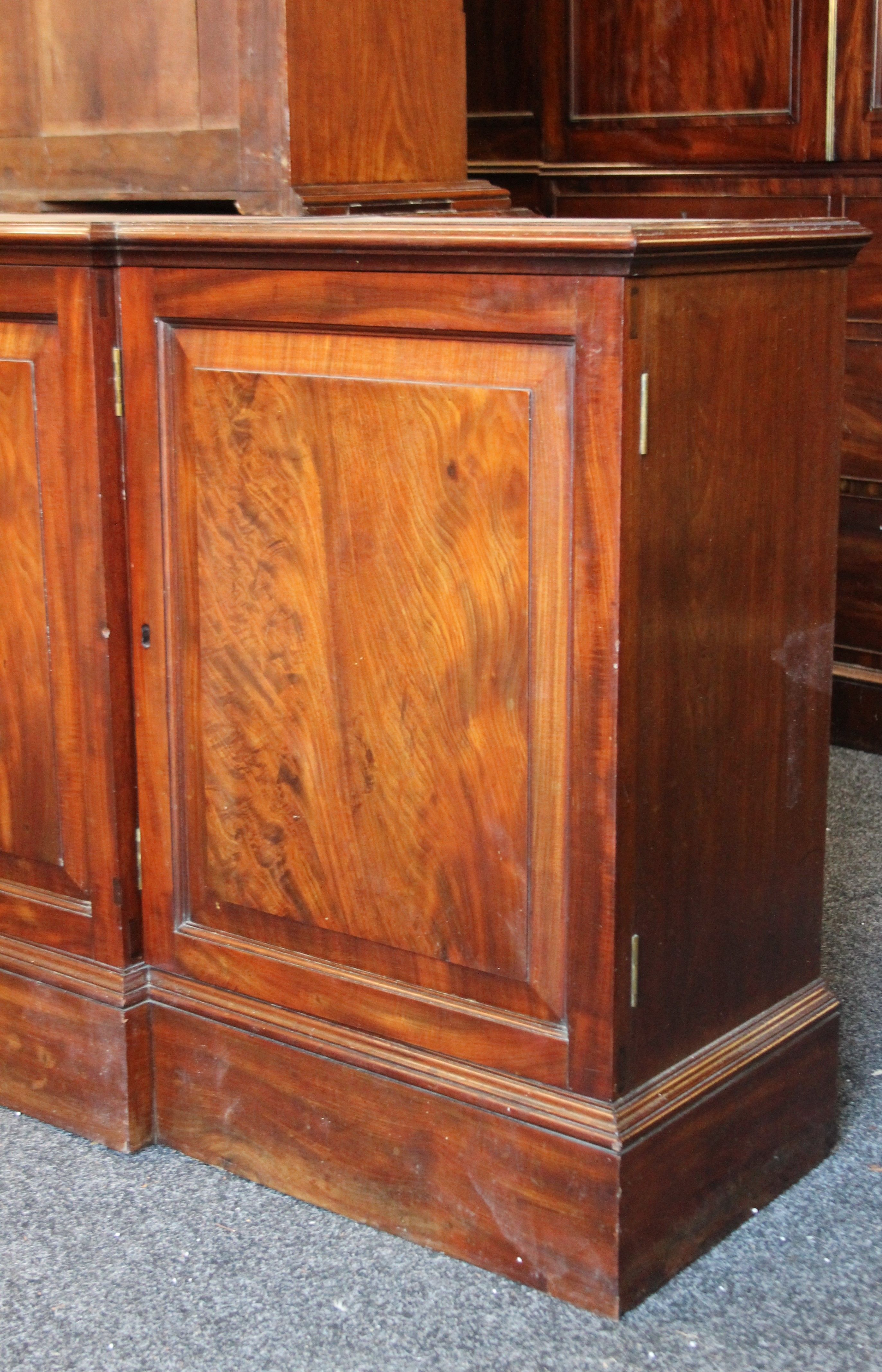 A near pair of early 19th century and later mahogany breakfront bookcases (one probably made to - Image 11 of 18