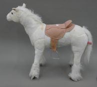 A child's cuddly model horse.