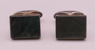 A pair of silver cufflinks. 1.5 x 1.25 cm.