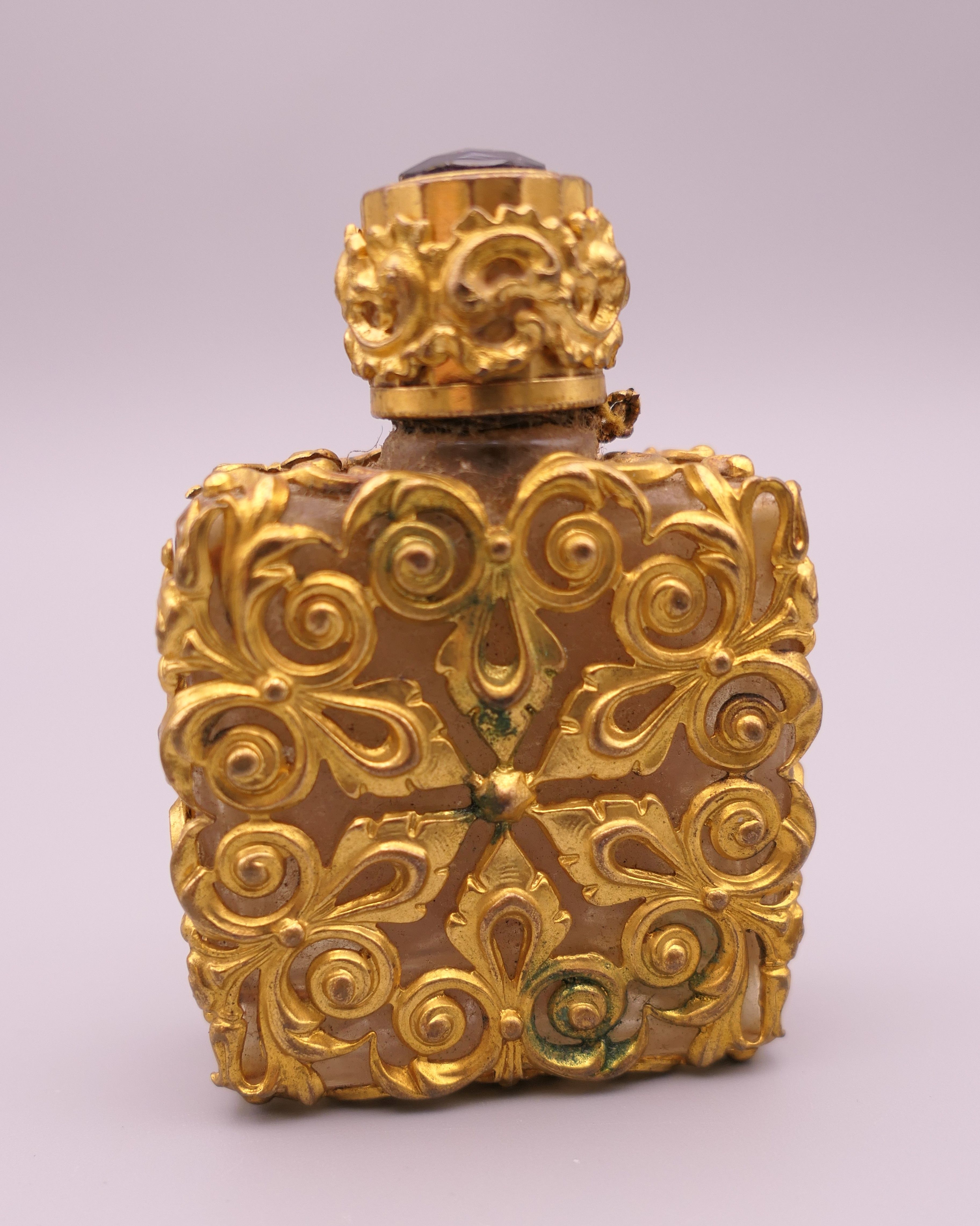 Four vintage perfume/scent bottles. Largest 8 cm high. - Image 8 of 8