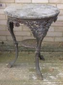 A Victorian cast iron pub table. 60 cm diameter.