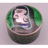 An Indian silver enamel box. 4.25 cm diameter.