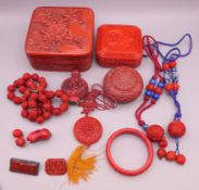 A quantity of various cinnabar lacquer items, including boxes, beads and a coral rabbit, etc.