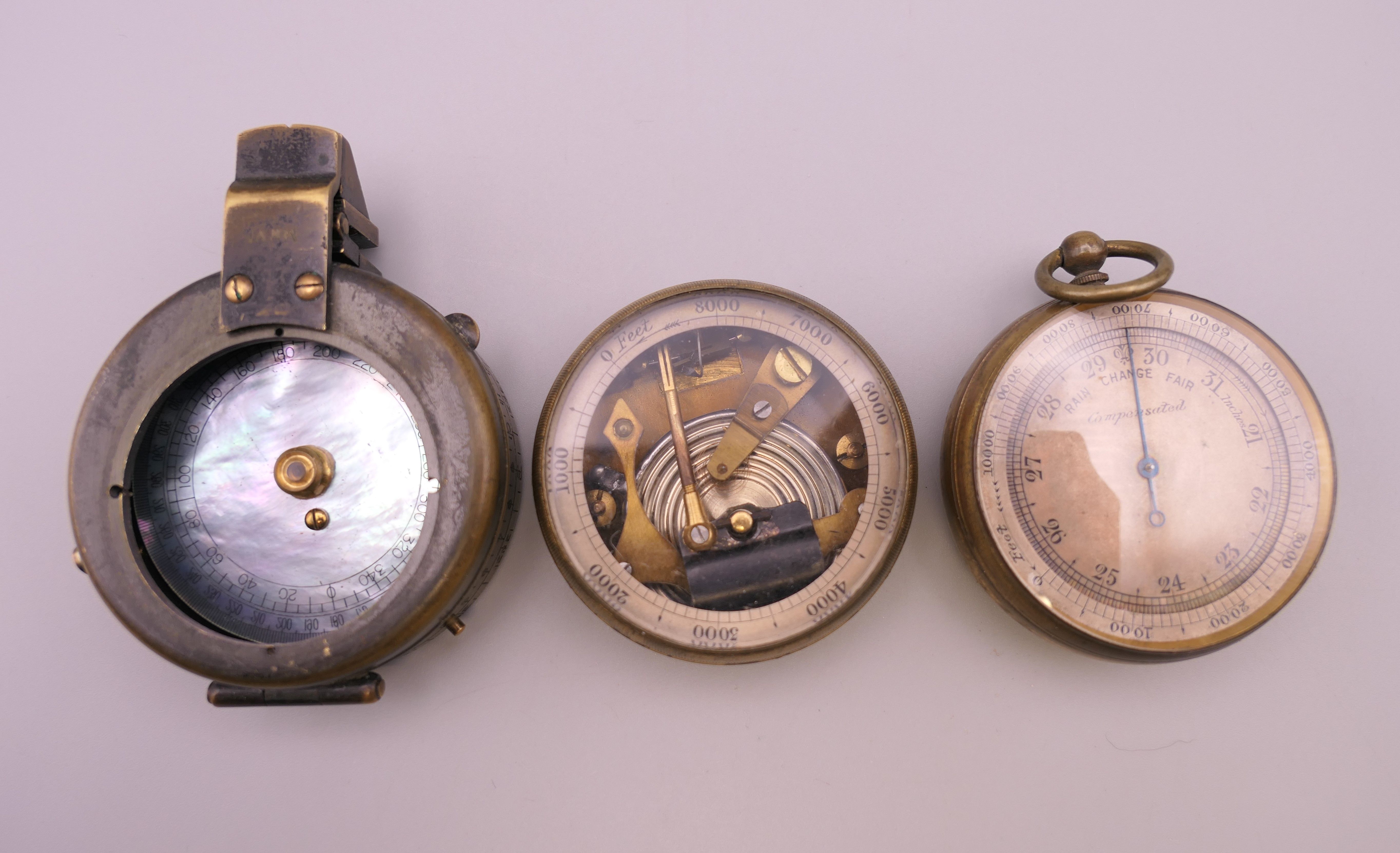 A Short & Mason of London barometer and two others. The former 5.5 cm diameter.