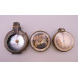 A Short & Mason of London barometer and two others. The former 5.5 cm diameter.