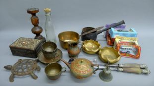 A box of miscellaneous vintage items, including an African carved spoon.