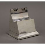 A silver combination stamp box and inkwell. 9.5 cm high. 260 grammes total weight.