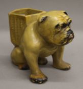 A bulldog form vase. 16.5 cm high.