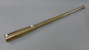 An extendable telescope. 90 cm extended.