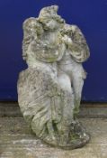 A garden statue formed as a courting couple. 69 cm high.