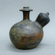 A Chinese brown glazed Kendi, possibly Song/Yuan Dynasty. 14.5 cm high.