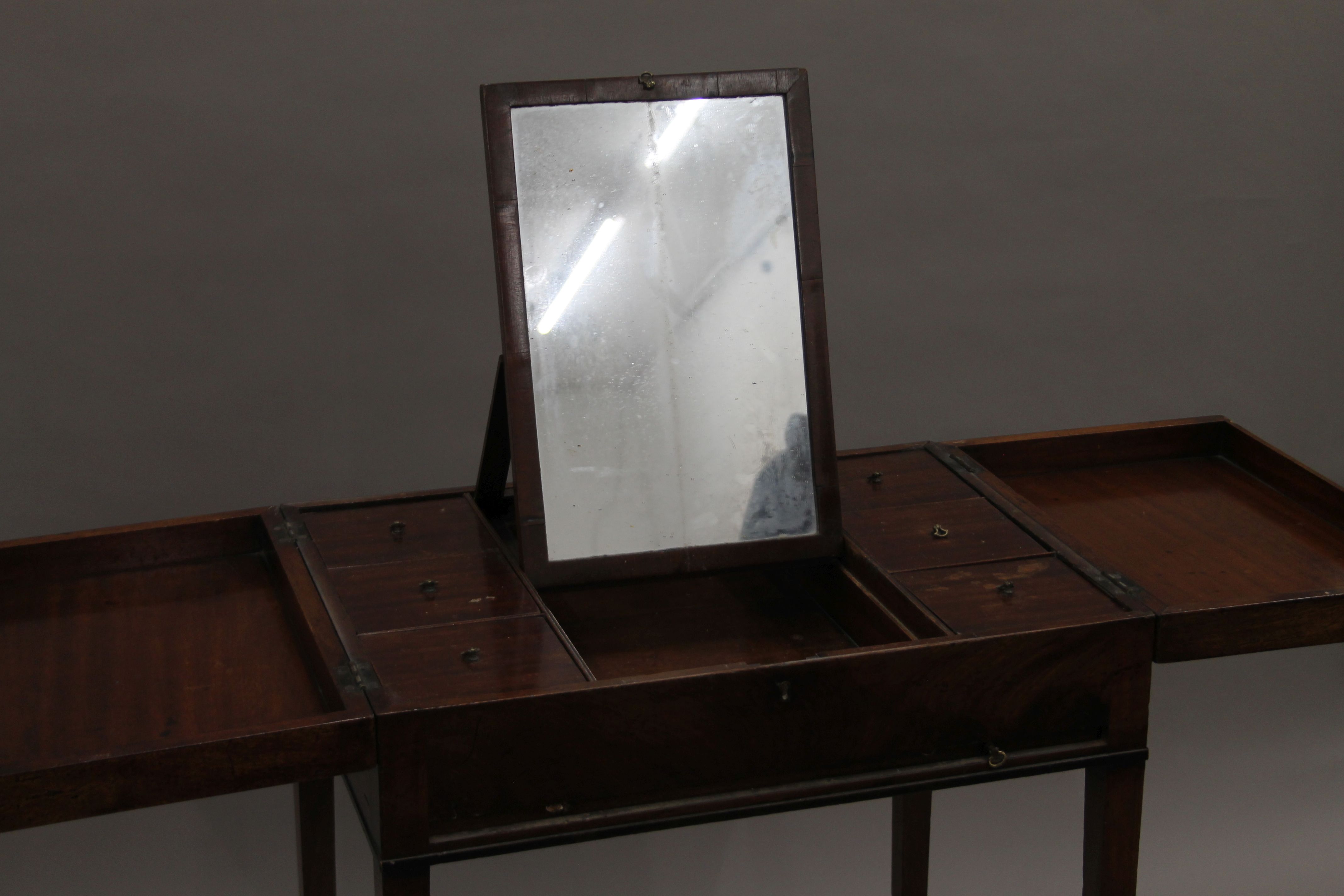 A 19th century mahogany gentleman's fold over dressing table. 63 cm wide. - Image 4 of 8