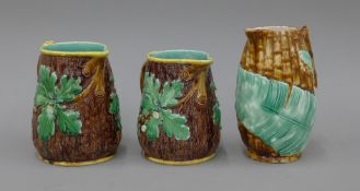 Two Minton Majolica jugs and another.