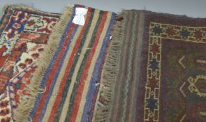Three old prayer rugs. 123 x 72.5 cm, 131 x 72.5 cm, 132 x 82.5 cm respectively.