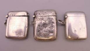 Three silver vestas. Largest 4.5 x 3.5 cm.