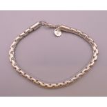 A silver bracelet. 20 cm long.