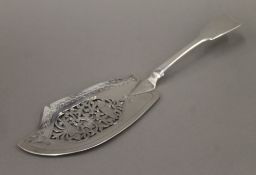 A silver fish slice, hallmarked 1837. 30 cm long. 4.5 troy ounces.