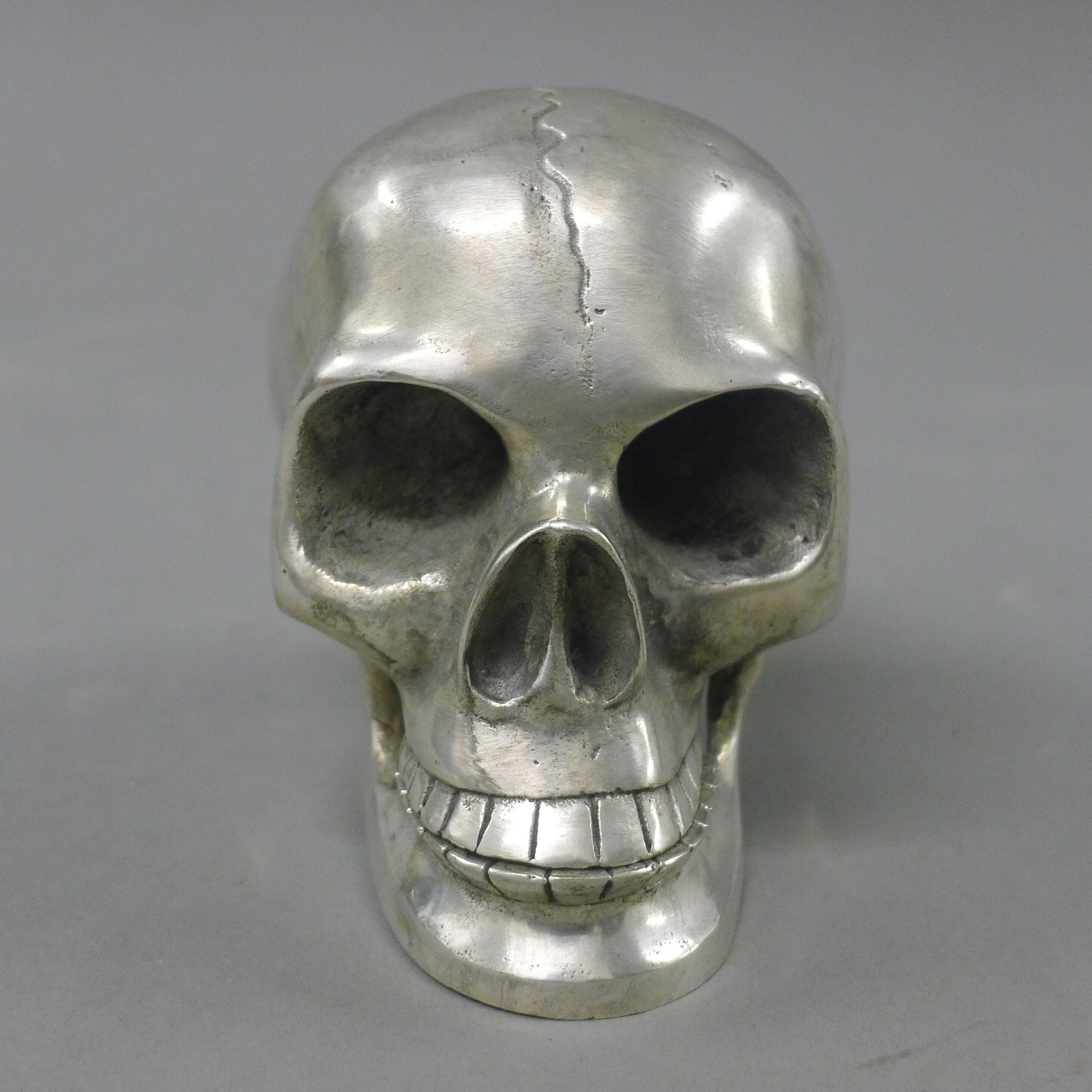 A silver plated model skull. 9 cm high. - Image 2 of 2