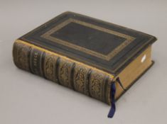 A finely bound Family Bible with gilt edge pages, approximately 900 engravings, 1875, first edition.