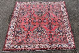 A Hamadan carpet. 180 x 151 cm.