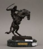 After FREDERIC REMINGTON (1861-1919) American, a bronze model of 'Bronco Buster',