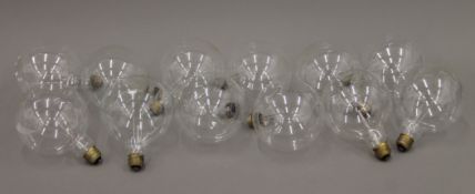 A quantity of large retro style light bulbs. Approximately 16 cm high.