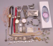 A collection of wristwatches and costume jewellery.