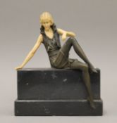 An Art Deco style figure of a lady. 21 cm high.