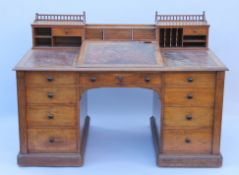 A 19th century mahogany desk by Gillows of Lancaster, central drawer stamped 'Gillow'.