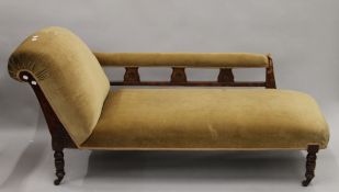 A Victorian upholstered chaise lounge. Approximately 170 cm long.
