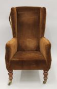 A Victorian upholstered armchair.