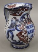 A Portuguese faience jug. 18.5 cm high.