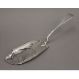 An Irish silver fish slice, hallmarked 1820. 31 cm long. 5.2 troy ounces.