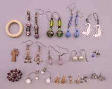 A quantity of earrings, including two pairs of 9 ct gold earrings. Blue bead earrings 5 cm long.