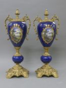 A pair of blue ground Sevres style vases. 45 cm high.