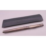 A Yard-O-Led silver fountain pen together with a Yard-O-Led leather pen case. Pen 14 cm long.
