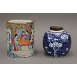 A 19th century Canton brush pot and a ginger jar. The former 15.5 cm high.