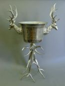 A large wine cooler with stag head handles. 107 cm high.