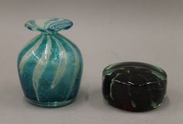 Two 1970's Mdina glass items - a vase and a paperweight. The former 14 cm high.