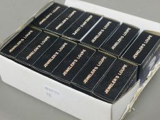 A box of jewellers loupes.