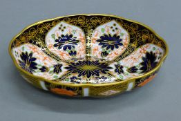 A Crown Derby oval porcelain dish. 14 cm wide.