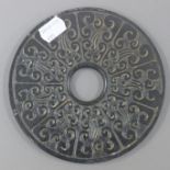 A Chinese bi disc. 15 cm diameter.