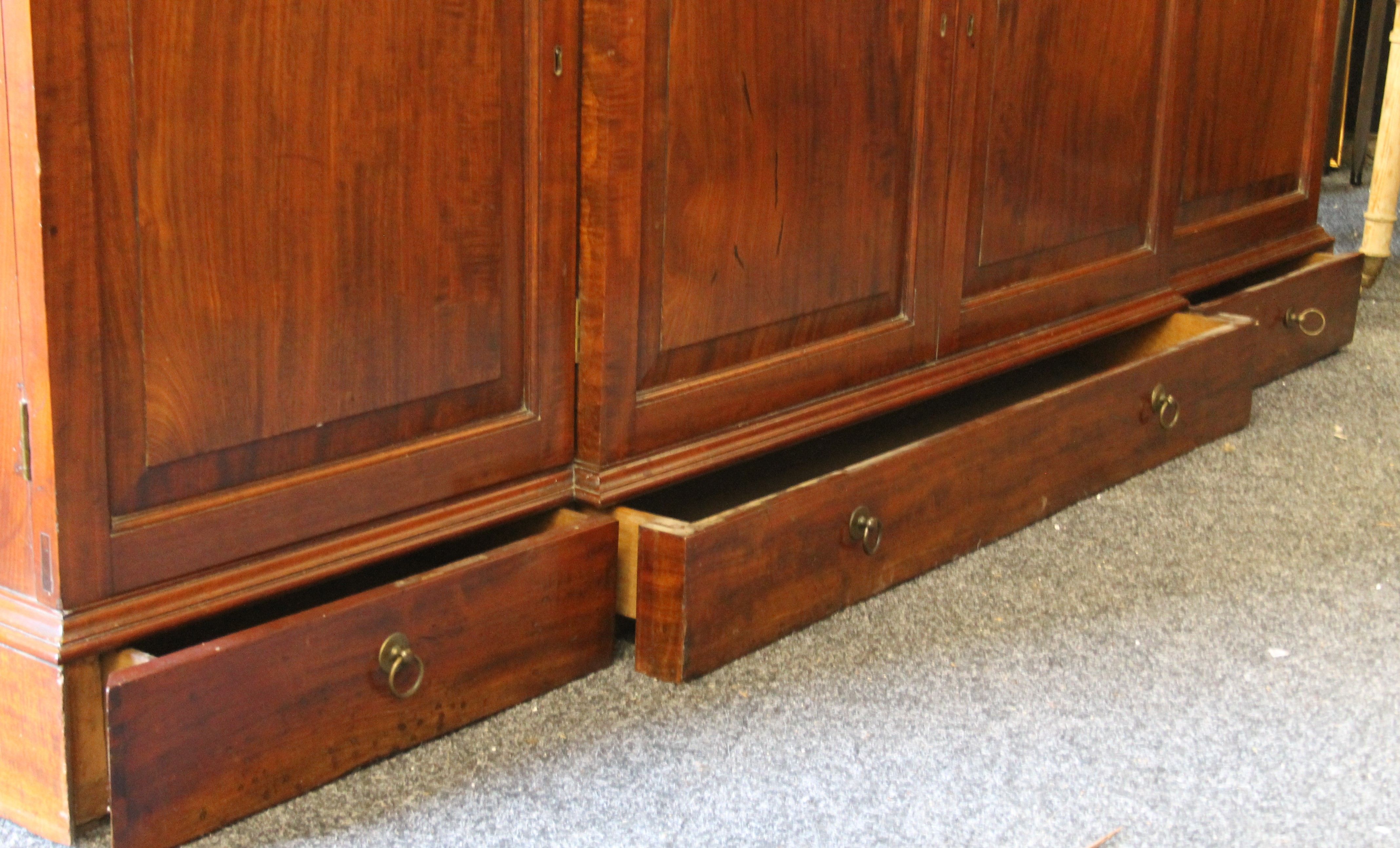 A near pair of early 19th century and later mahogany breakfront bookcases (one probably made to - Image 7 of 18