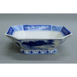 A Chinese canted rectangular form blue and white porcelain bowl, with square seal mark to base. 22.